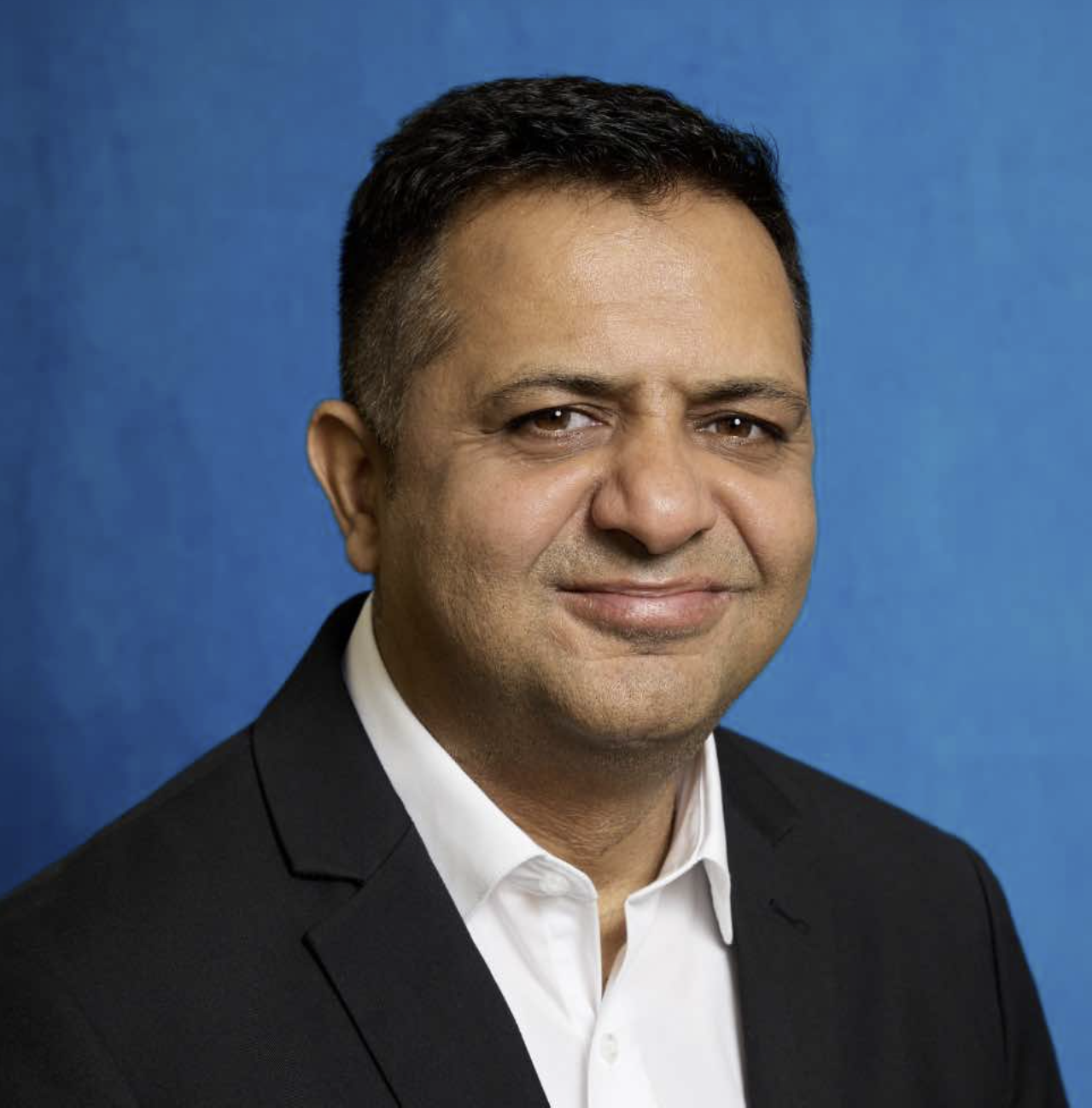 Headshot of Raj Mehta, President/COO